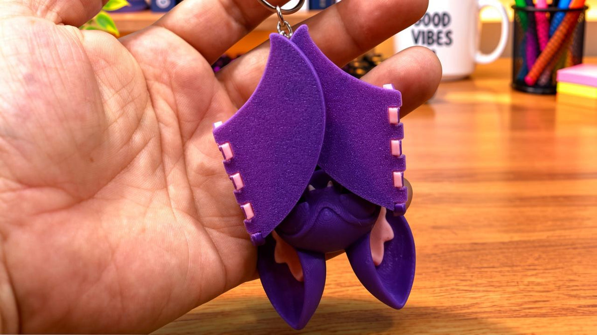 Articulated Bat Keychain with Magnetic Folding Wings