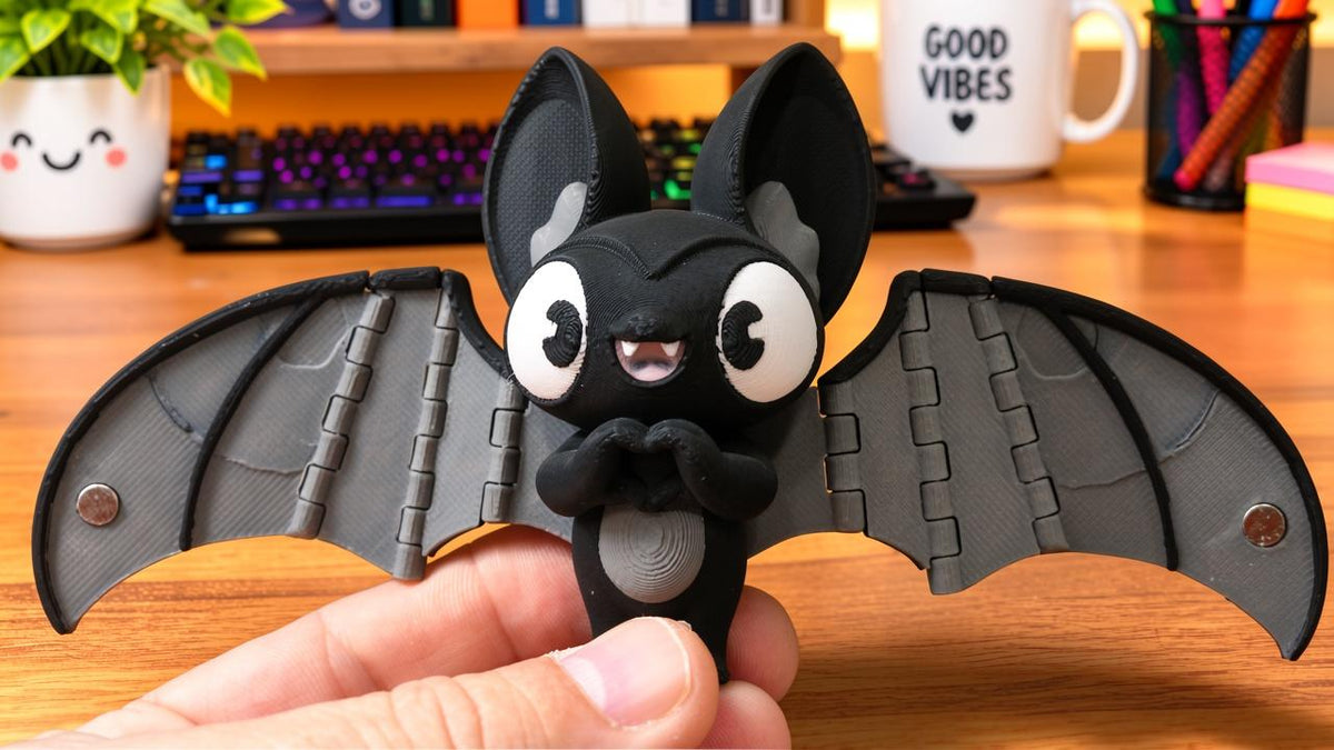 Articulated Bat Keychain with Magnetic Folding Wings