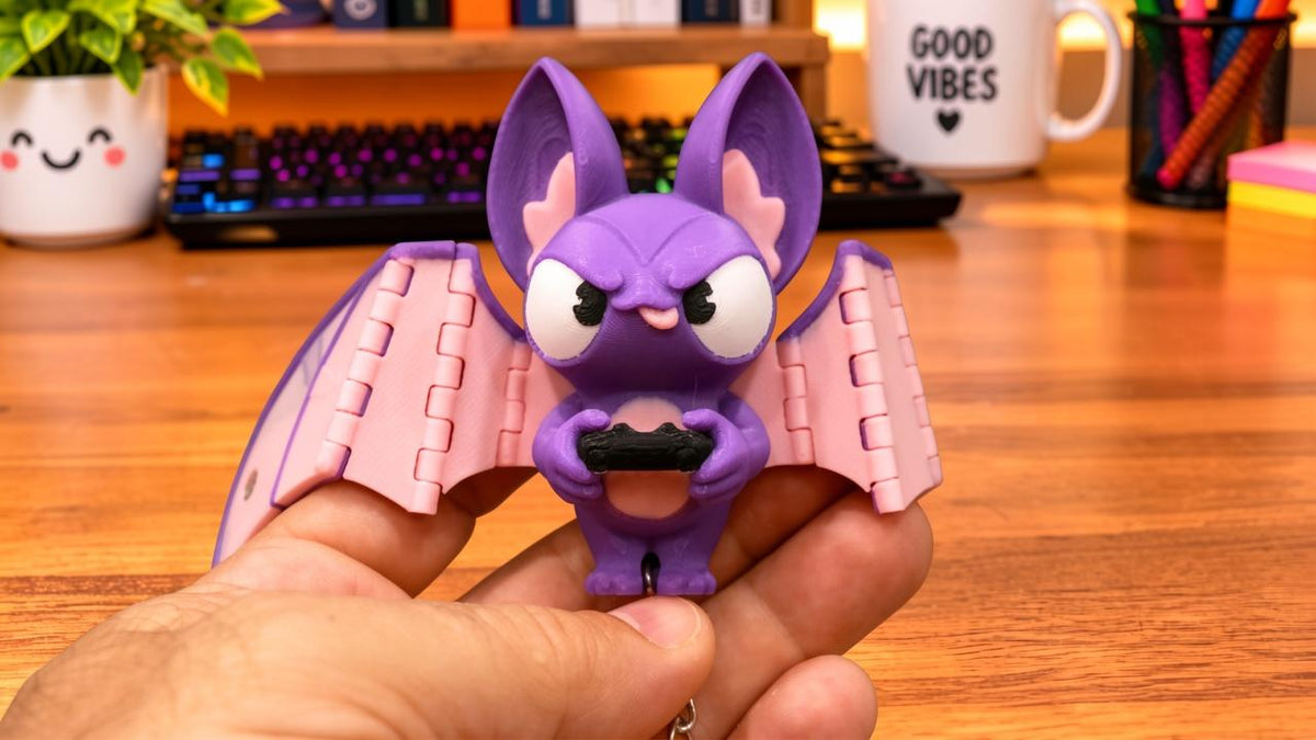 Articulated Bat Keychain with Magnetic Folding Wings