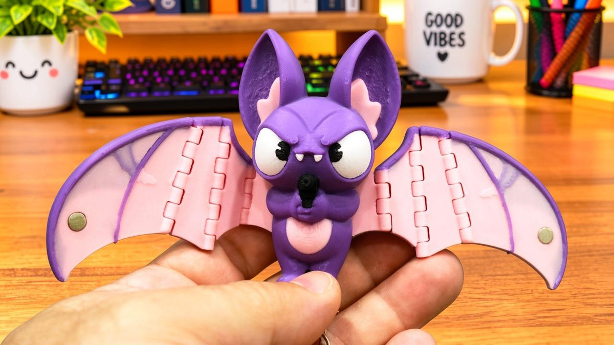 Articulated Bat Keychain with Magnetic Folding Wings