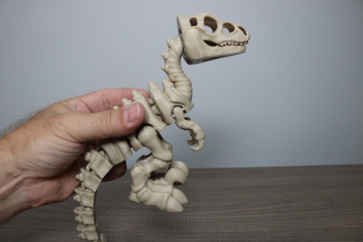 Articulated Velociraptor Figurine